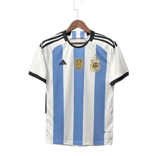 חולצת כדורגל נבחרת ארגנטינה בית - מונדיאל 2022 (3 כוכבים)